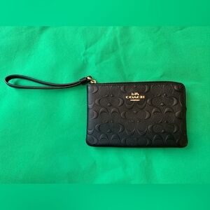 Coach Embossed Black Wristlet